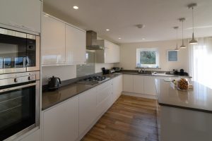 The kitchen area at Trebriani with built in oven and gas hob