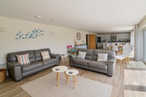 Open plan lounge area with comfortable seating at Trebriani