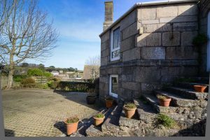 Exterior steps leading to the garden at The Granite House