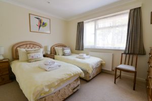The second twin bedroom at Tamarisk which shares an ensuite with the other twin bedroom