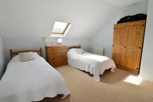 First floor twin bedroom at Little Tremawr