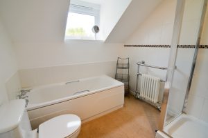 First floor bathroom with separate shower and bath at Little Tremawr