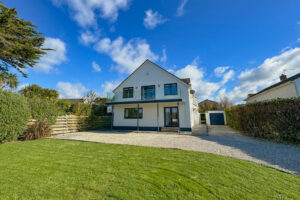 Front exterior of Little Tremawr from large grassed garden
