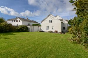Rear exterior view of Little Tremawr from large grassed garden