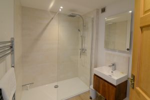 Ensuite bathroom on the ground floor at Little Tremawr with large walk in shower