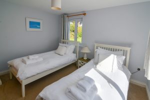 Ground floor twin bedroom at Little Tremawr