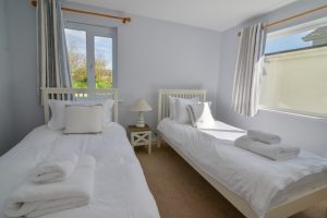 Ground floor twin bedroom at Little Tremawr