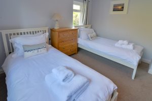 Ground floor twin bedroom at Little Tremawr