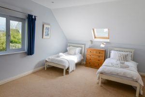 Twin beds on the first floor at Little Tremawr