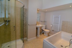En suite bathroom off of bedroom 1 on the second floor