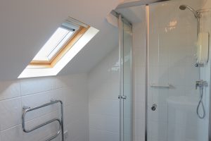 Ensuite bathroom with shower from Bedroom 3 at Newlands