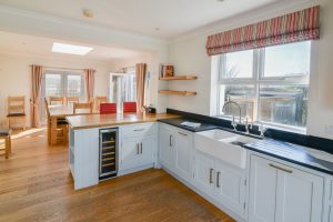 Well equipped kitchen and dining area at Newlands