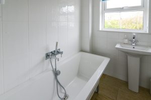 First floor bathroom with separate bath tub at Newlands