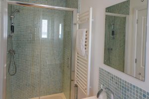 Ground floor bathroom with walk in shower at Newlands