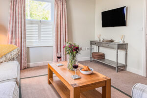Mounted TV in smaller lounge at Newlands