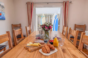Dining table at Newlands leading out to the patio