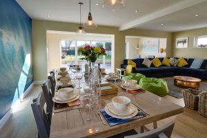 Open plan living area with large dining space at Rumah Panjang