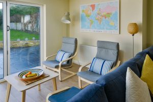 Extra seating area and bifold doors at Rumah Panjang