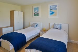 Ground floor twin bedroom at Rumah Panjang