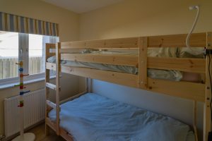Bunk bed bedroom on the ground floor at Rumah Panjang