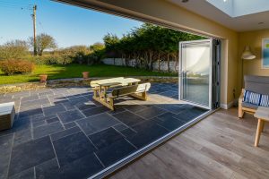 Bifold doors leading to large patio to the rear of Rumah Panjang