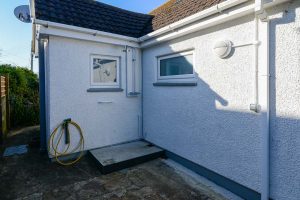 Outdoor shower to the side of Rumah Panjang