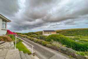View down the valley from the front staps at 't Sandt past the adjacent house