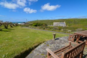 View of the garden from the patio and view towards the ocean