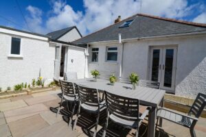 Outside dining area and patio at the rear of Lowena