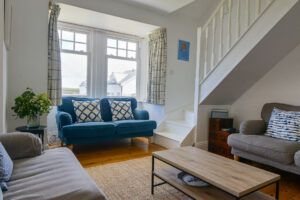 Staircase leading from the lounge to the first floor at Lowena