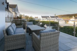 Seating on the patio in the front garden at Pendarves