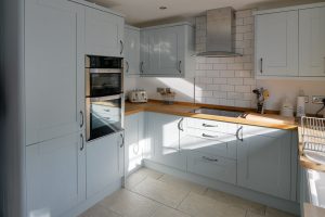 Kitchen at Pendarves with integrated ovens and hob