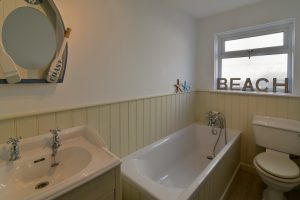 Ground floor family bathroom with separate bath tub