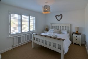 King sized bedroom on the ground floor at Pendarves