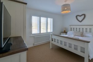 King sized bedroom on the ground floor at Pendarves