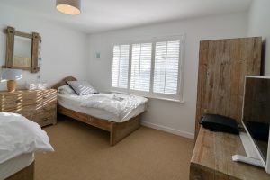 Twin bedroom on the ground floor at Pendarves