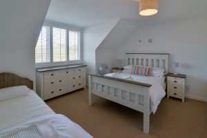 Double bedroom on the first floor at Pendarves with extra day bed