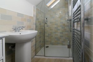 En suite bathroom with walk in shower from Bedroom 1 at Pendarves