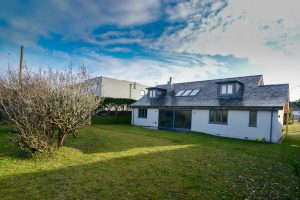 Exterior rear view of Ysella from the large grassed garden area