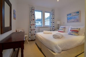 King ground floor bedroom at Bass Cottage