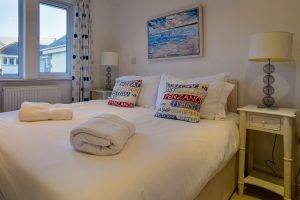 King ground floor bedroom at Bass Cottage