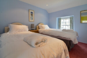 Twin bedroom at Treburrick Farm House