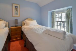 One of the twin beds at Treburrick Farm House