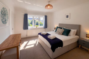 The third king bedroom at Tristan which has a ensuite and window to the rear garden