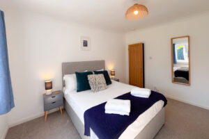 The third king bedroom at Tristan which has a ensuite and window to the rear garden