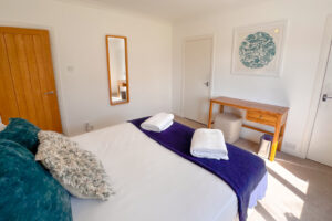 The third king bedroom at Tristan which has a ensuite and window to the rear garden