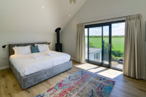 Super king bedroom on the first floor at San Marcos with sliding doors to Juliette balcony