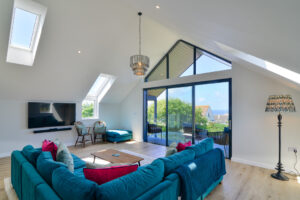 Lounge area with bi fold doors on the first floor at San Marcos
