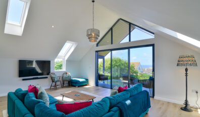 Lounge area with bi fold doors on the first floor at San Marcos