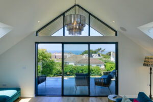 Large windows and glass doors on the first floor at San Marcos